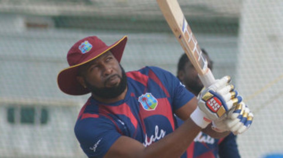 Kieron Pollard bats during training