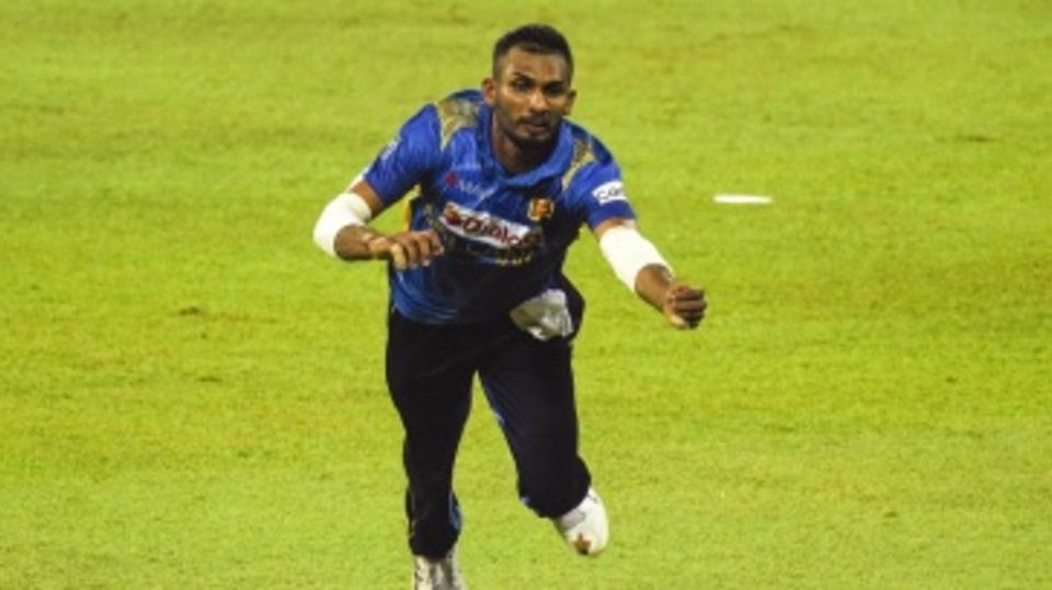 Sri Lanka captain Dasun Shanaka dives to stop a ball