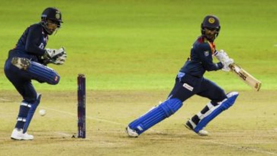 Dhananjaya de Silva guides the ball behind square