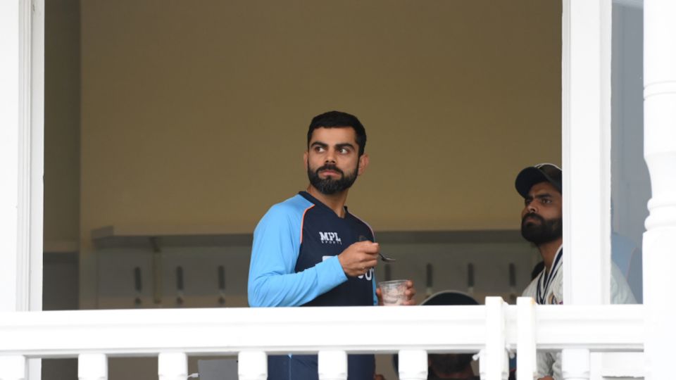 Virat Kohli and Ravindra Jadeja wait as rain holds sway at Trent Bridge