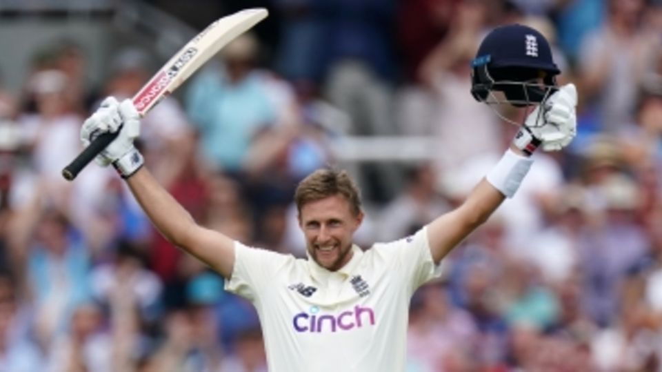 Joe Root is all smiles after getting to a century