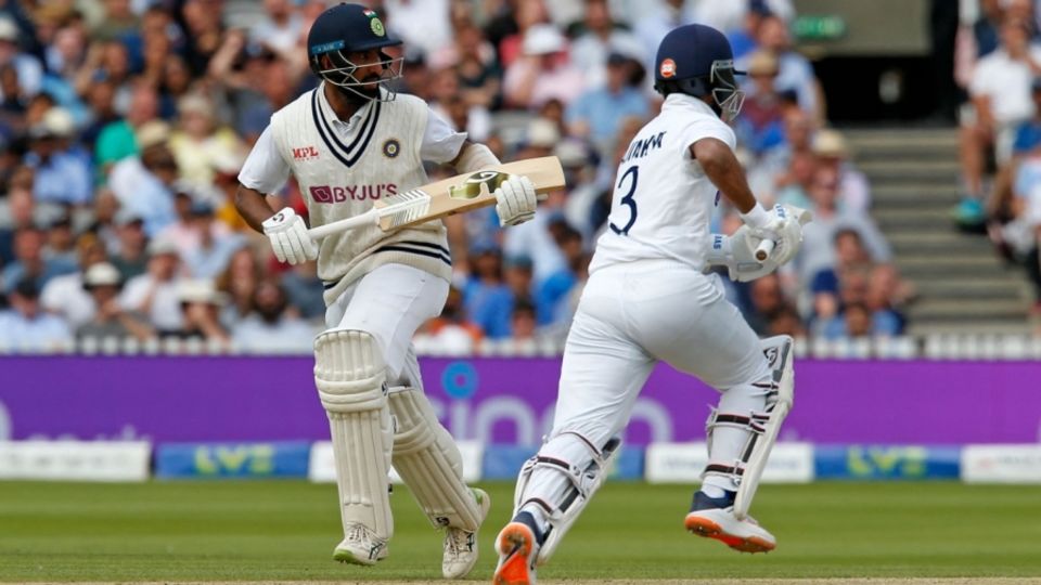 Ajinkya Rahane and Cheteshwar Pujara cross for a run