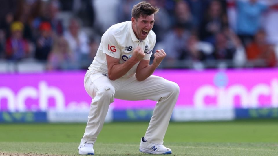 Craig Overton celebrates a wicket