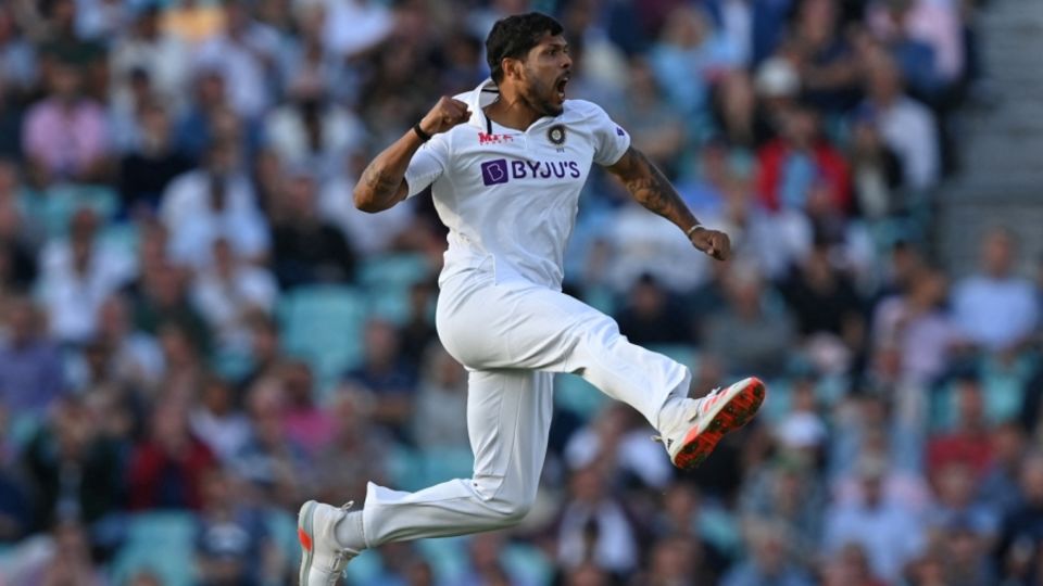 Umesh Yadav is pumped up after bowling Joe Root