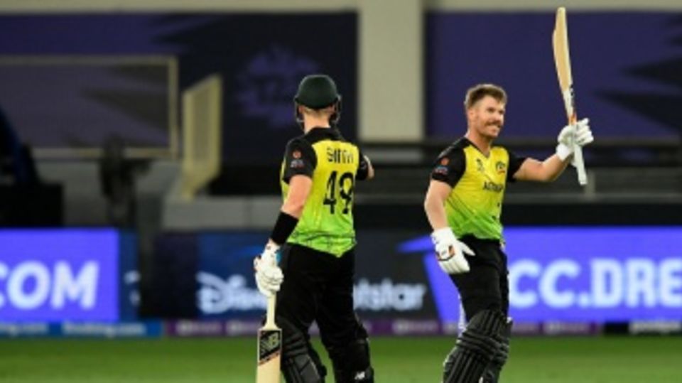 David Warner raises his half-century