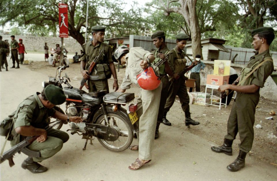 Sri Lankan soldiers conduct security checks outside the SSC during the 1996 World Cup. Australia and West Indies refused to send their teams to play in Colombo after a bomb attack there in January that year