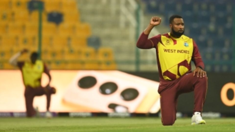 Kieron Pollard takes a knee
