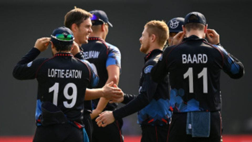 The Namibia players get together in celebration