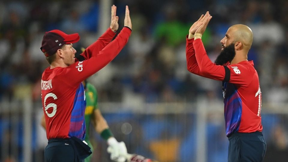 Moeen Ali and Eoin Morgan celebrate during the T20 World Cup