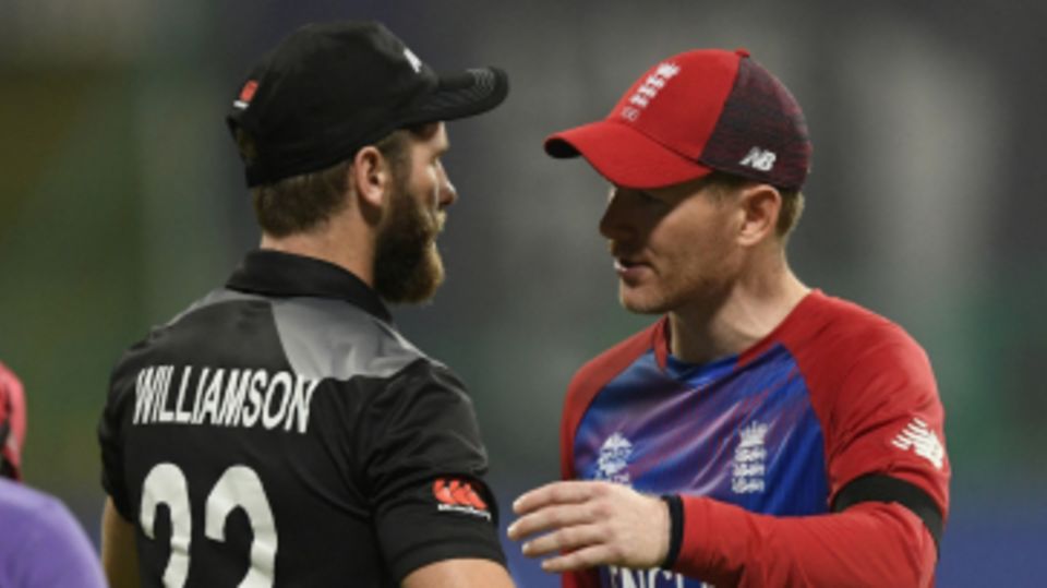 Kane Williamson and Eoin Morgan greet each other after the game