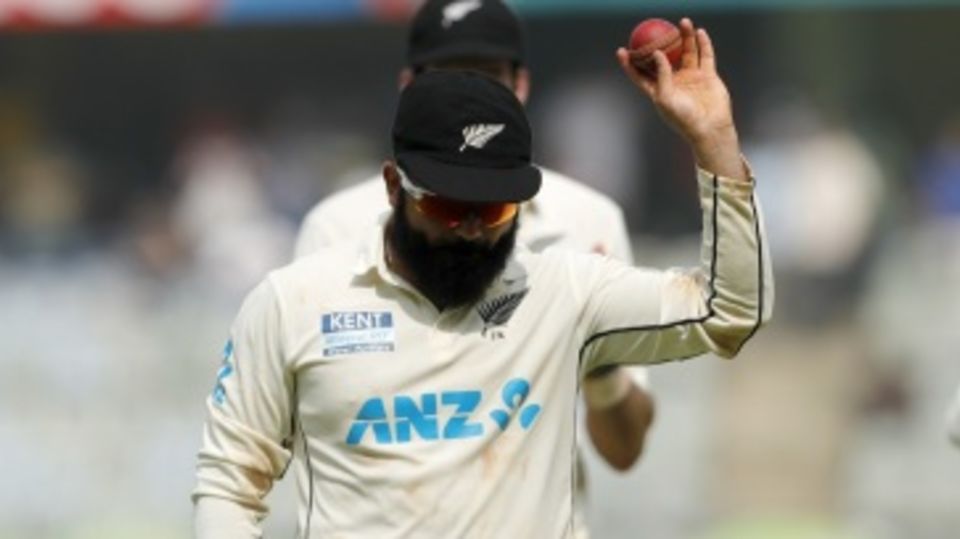 Ajaz Patel acknowledges the cheers after becoming only the third bowler to take all ten wickets in a Test innings
