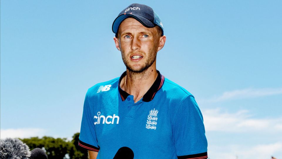 Joe Root addresses the media before training