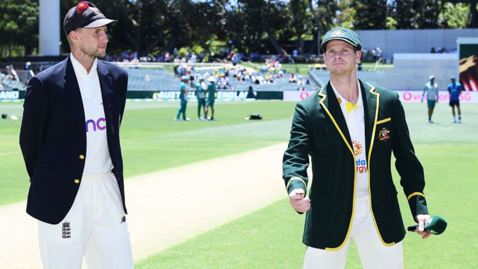Australia's stand-in captain Steven Smith tosses the coin