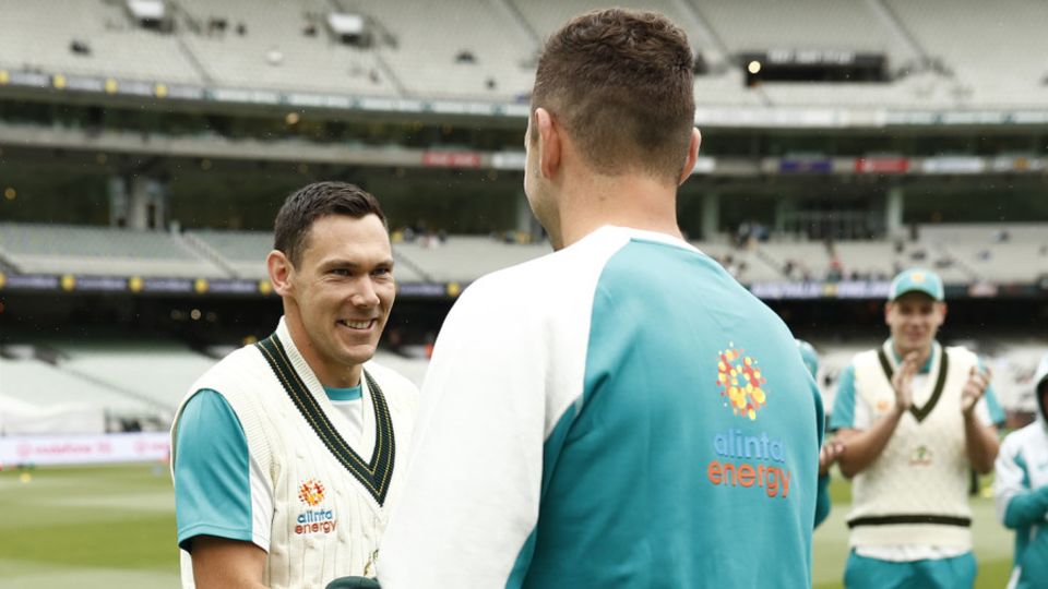 Josh Hazlewood presents Test debutant Scott Boland with his 'Baggy Green' cap
