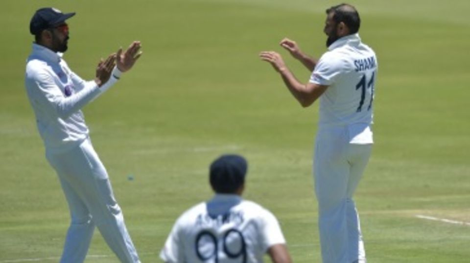 Mohammed Shami celebrates a wicket with KL Rahul