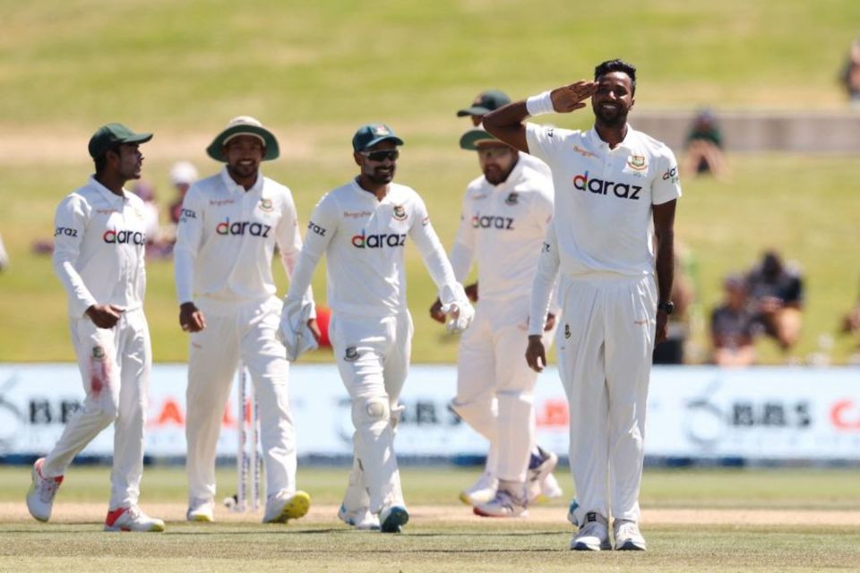 Happy to serve: Ebadot salutes after one of his wickets