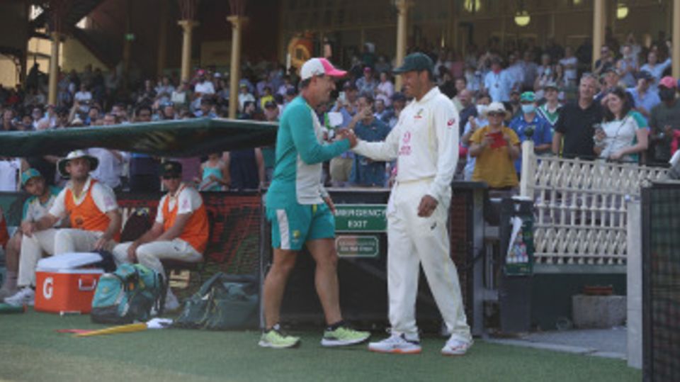 Usman Khawaja and Justin Langer are all smiles