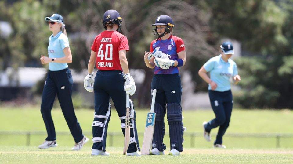 Amy Jones and Heather Knight have a chat in the middle during England's intra-squad warm-up T20 in Canberra