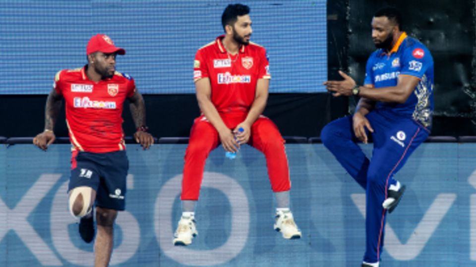 Fabian Allen, Shahrukh Khan and Kieron Pollard have a chat