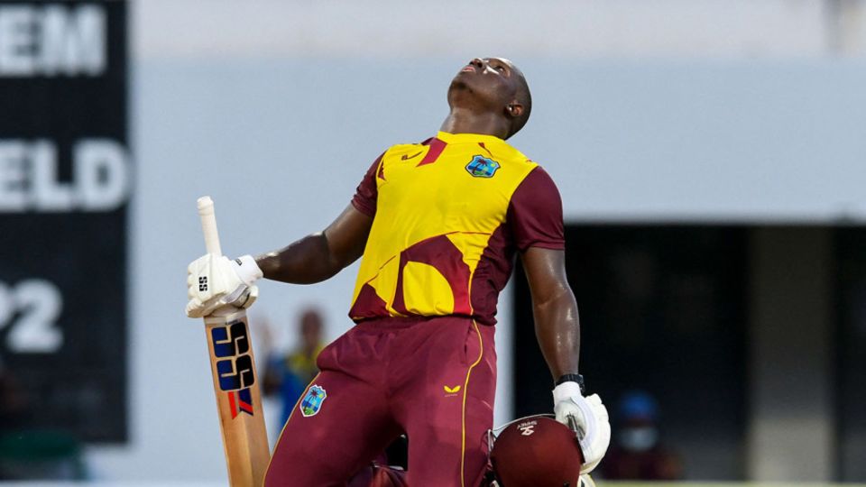 Rovman Powell sinks to his knees after reaching three figures