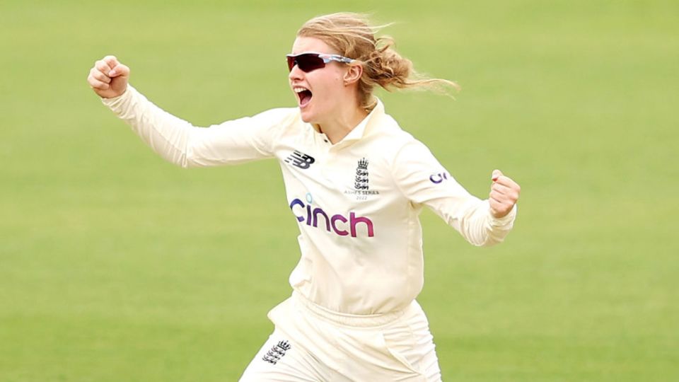 Charlie Dean celebrates her first Test wicket
