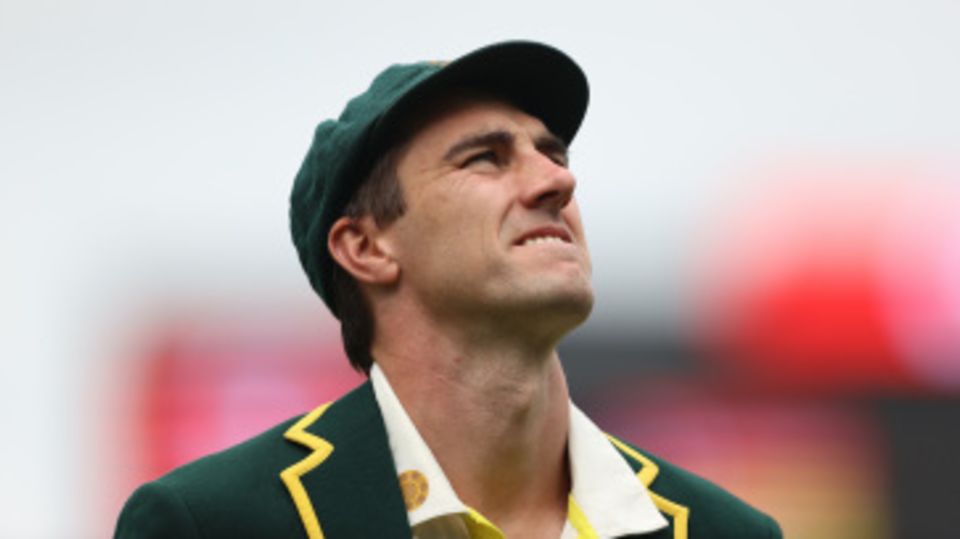 Pat Cummins wait for the coin to drop at the toss
