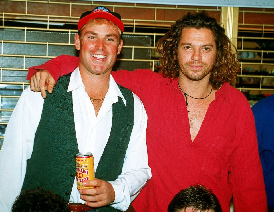 Warne with INXS frontman Michael Hutchence in 1993