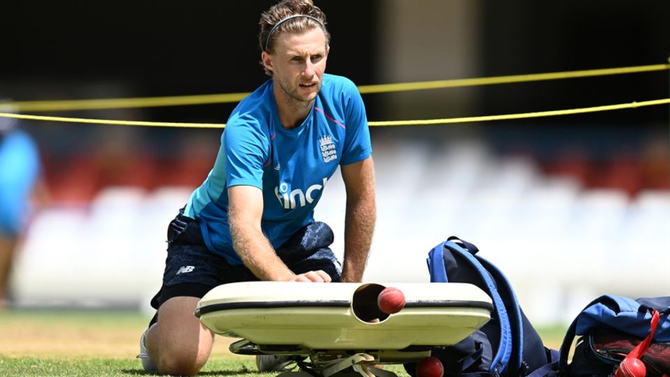 Joe Root feeds balls during a training drill