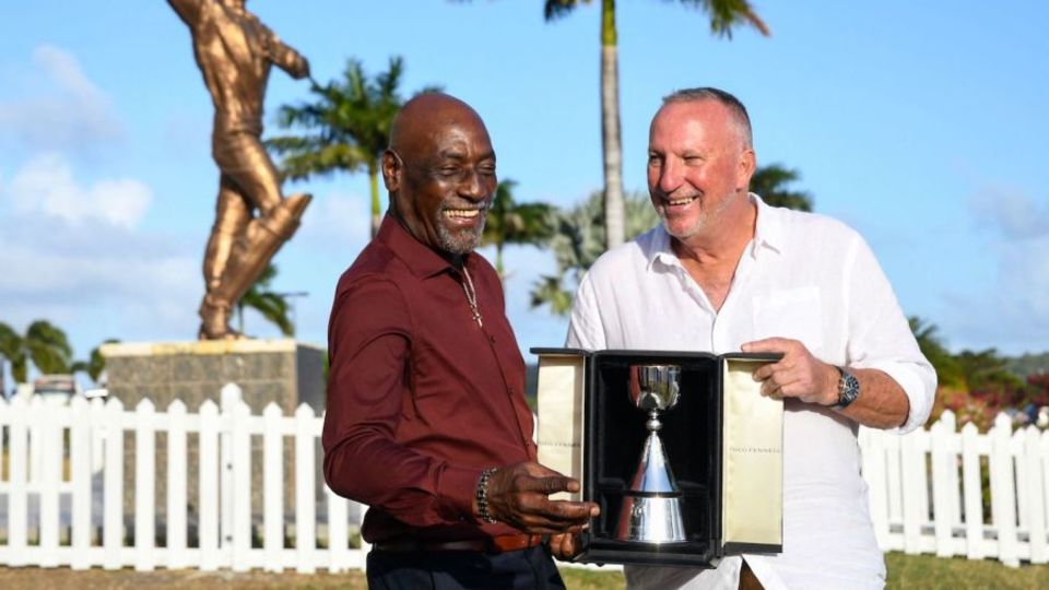 Sir Viv Richards and Sir Ian Botham are all smiles as they pose with the trophy named after them