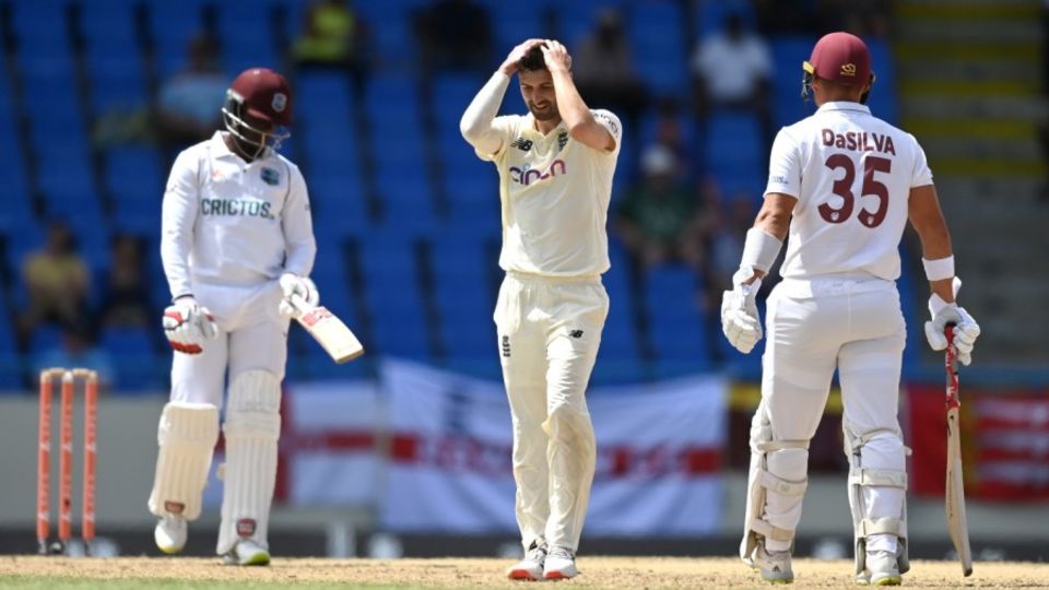 Mark Wood left the field with an elbow injury
