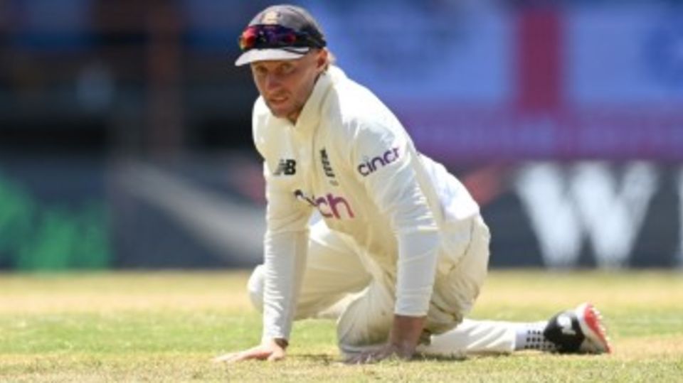 Joe Root looks on after failing to cut off a single