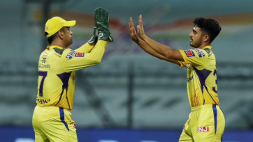 Mukesh Choudhary celebrates with MS Dhoni after taking the catch to dismiss Liam Livingstone