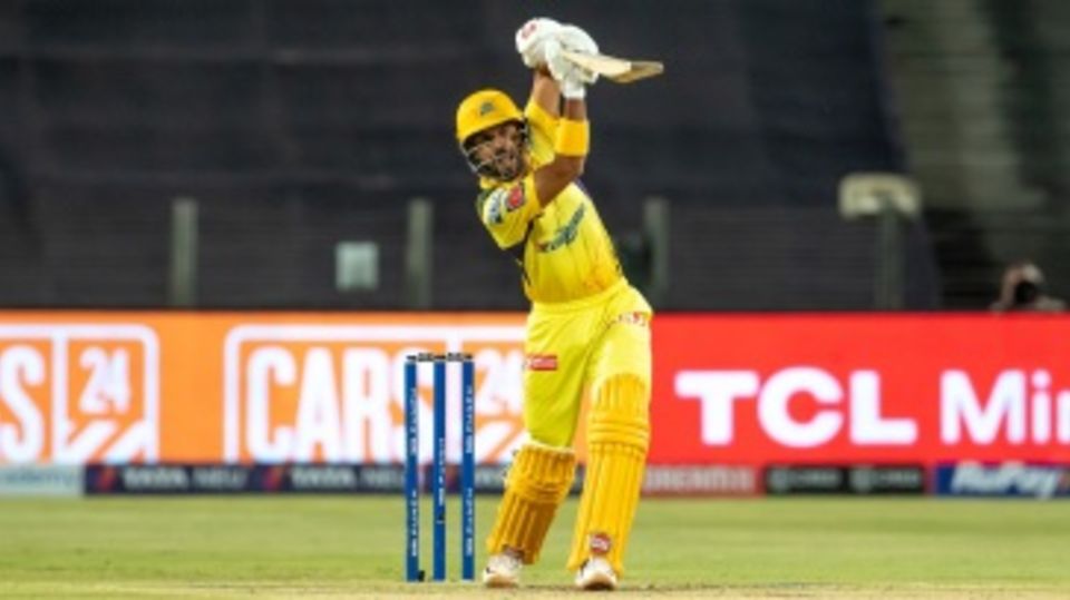 Ruturaj Gaikwad holds the pose after hitting Umran Malik for a six over long-off