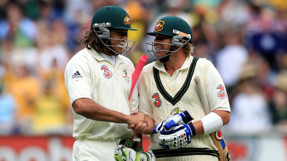 Andrew Symonds and Shane Warne shake hands during the 2006-07 Ashes