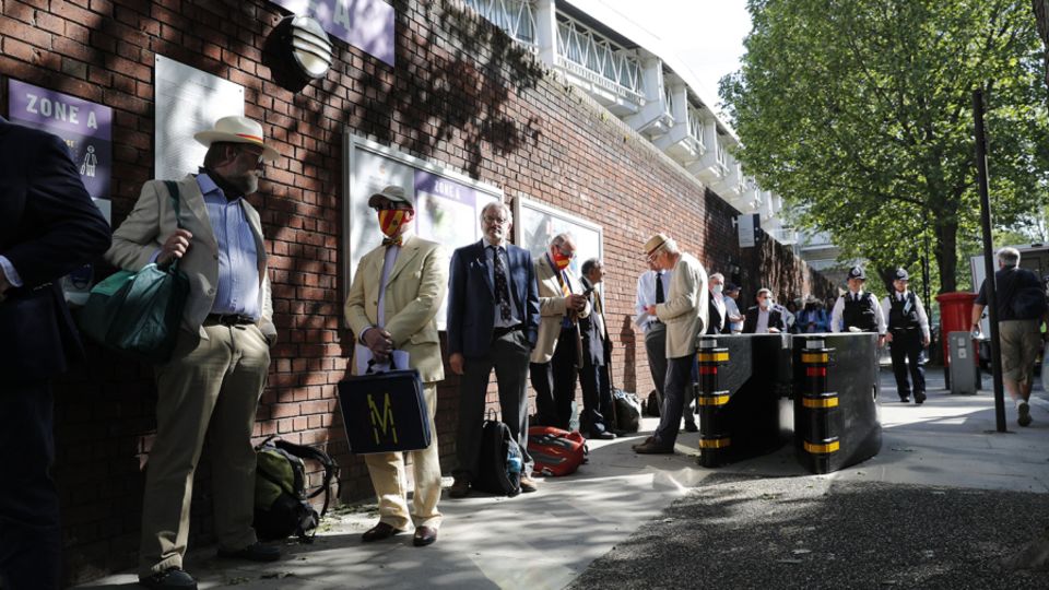 MCC members queue outside Lord's
