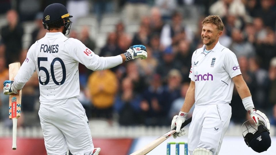 Joe Root is congratulated by Ben Foakes after the former reached his 26th Test century