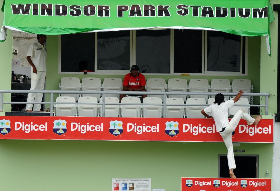 Ishant Sharma takes the shortest route to the players' enclosure in Dominica in 2011