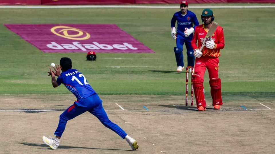 Nijat Masood's three-for helped Afghanistan restrict Zimbabwe to 159