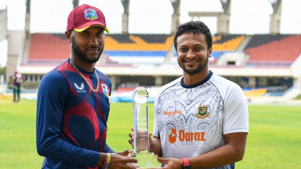 Kraigg Brathwaite and Shakib Al Hasan with the Test series trophy