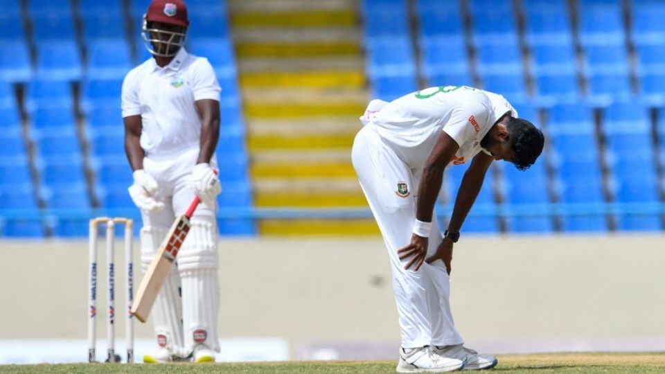A dejected Ebadot Hossain is on his haunches after an umpire's decision goes against him