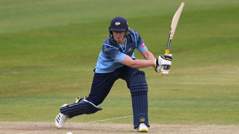 Tom Kohler-Cadmore drives through the covers