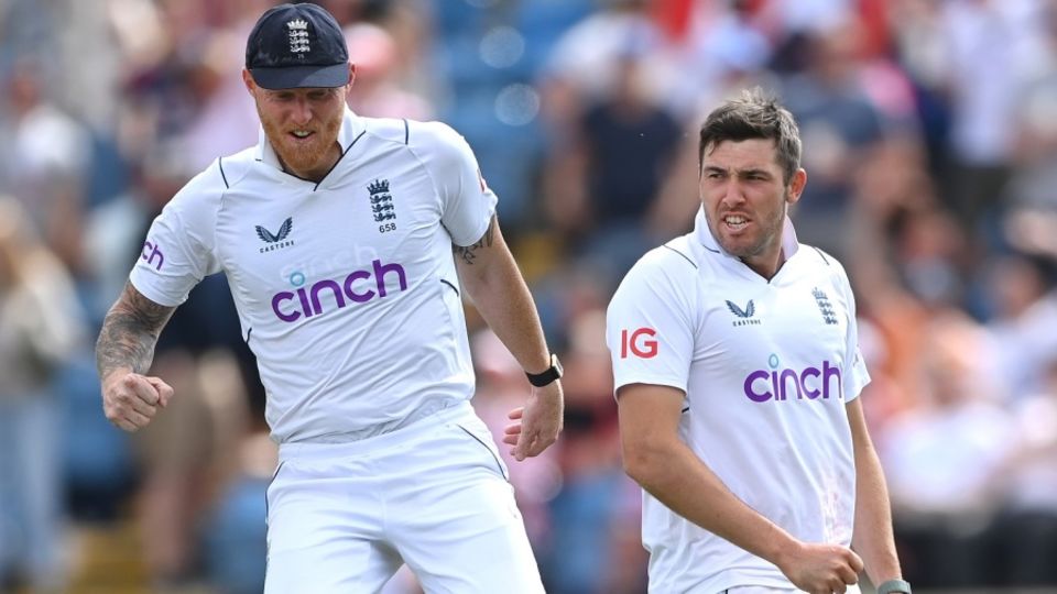 Jamie Overton celebrates with Ben Stokes after dismissing Tom Latham