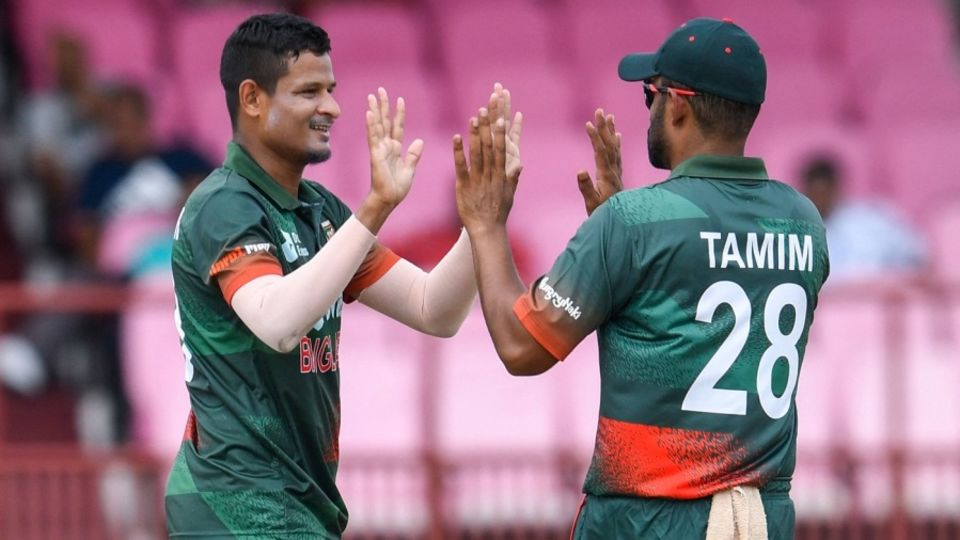 Nasum Ahmed celebrates with Tamim Iqbal