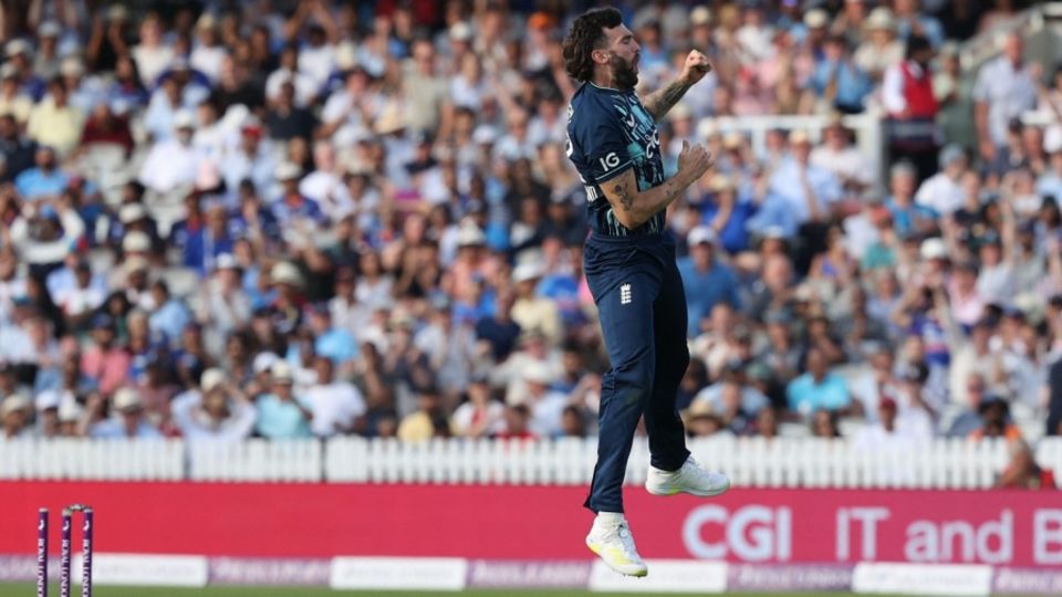Reece Topley leaps for joy