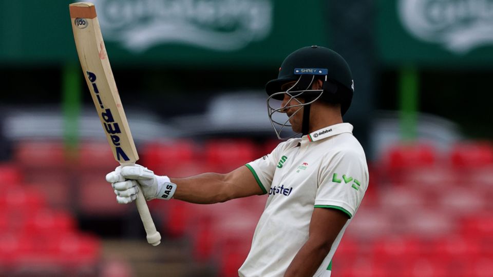 Ben Mike acknowledges the applause for his half-century