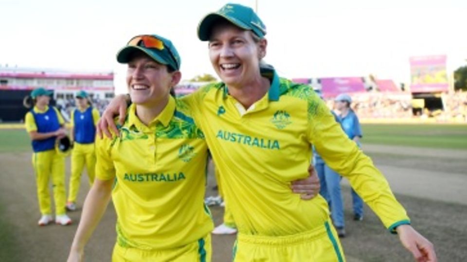 Megan Schutt and Meg Lanning are all smiles after Australia won the gold
