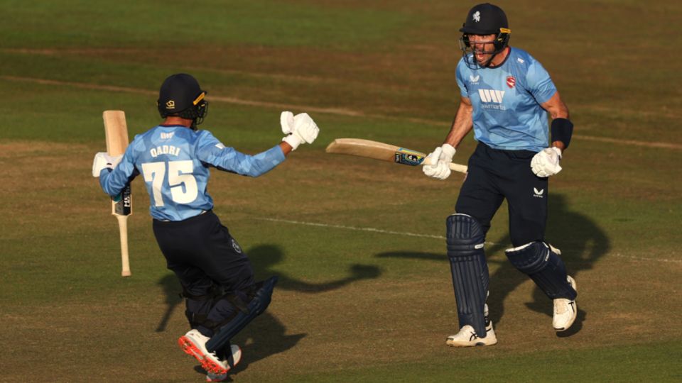 Grant Stewart celebrates after hitting the last ball for six to win the match