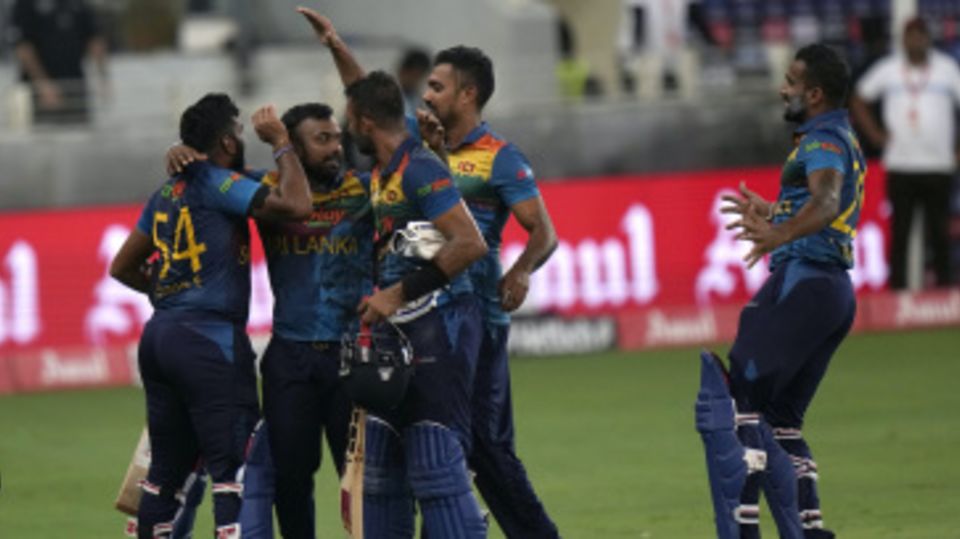 Sri Lanka's players celebrate after beating India