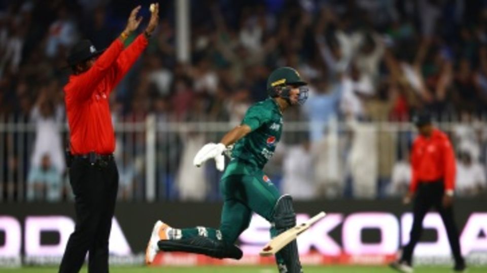 Naseem Shah wheels away after hitting the winning six