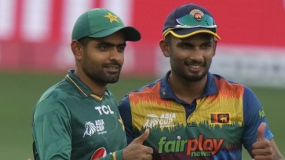 Babar Azam and Dasun Shanaka pictured at the toss